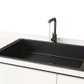Single Bowl Black Kitchen Sink With Faucet On White Countertop