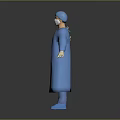 Blue Surgical Gown Worn by Medical Professional in Full Body Protective Attire