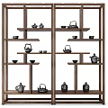 Traditional Wooden Chinese Display Shelf With Teapots And Tea Cups On Layered Shelves
