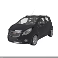 Dark Blue Compact Chevrolet Car With Roof Rack And Silver Wheels Design