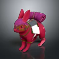 Pink Rabbit Figurine Adorned With Rolled Purple Cloth On Back Green Straps And White Cloth