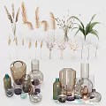 Various Ceramic Vessels With Dried Pampas Grass Fern Plants And Home Decor Elements