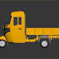 Yellow Three Wheeled Cargo Truck With Open Bed And Cabin On Dark Background With Reflection