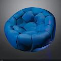 Modern Round Bean Bag Chair With Blue Puffed Sections And Comfortable Design