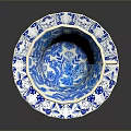 Blue and White Porcelain Teacup with Saucer Featuring Decorative Floral Patterns