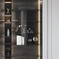 Modern Decorative Cabinet With Glass Doors And Interior Decorative Items Books And Lighting