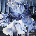 Illuminated Modern Art Installation With Circular Hanging Blue Transparent Elements And White Floral Sculpture