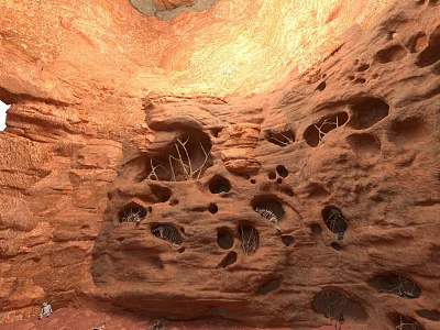 Natural Red Rock Interior With Sunlit Holes And Textured Stone Walls 3d model