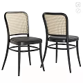 Two Modern Black Frame Chairs With Woven Backrest And Leather Seats 3d model