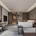 Modern Hotel Guest Room With King Bed Work Desk Laptop TV And Wall Art
