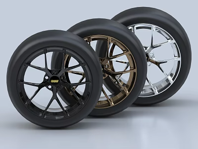 Three Automotive Tires With Black Gold Silver Rims And Different Designs 3d model