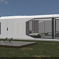 Modern White Space Capsule House With Large Glass Windows And Interior Sofa On Grass Field