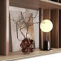 Modern Wooden Bookcase With Shelves Holding Books Vases Bowls And Sculptures