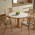 Minimalist Round Table With Woven Backrest Chairs For Home Dining Area 3d model