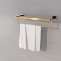 Soft White Towels Hanging On Modern Golden Towel Rack Against Gray Bathroom Wall