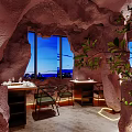 Cave Style Restaurant Interior With Rock Walls Ceiling Windows And Tables Chairs 3d model