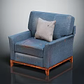 Vintage Distressed Blue Armchair With Gray Pillow And Solid Wooden Legs