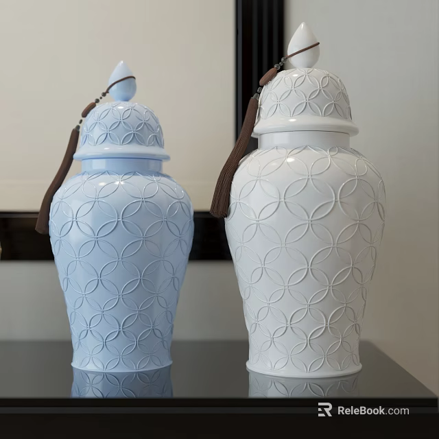 Blue And White Ceramic Vessels With Circular Patterns Lids And Brown Tassels For Decor 3d model 