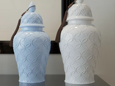 Blue And White Ceramic Vessels With Circular Patterns Lids And Brown Tassels For Decor 3d model