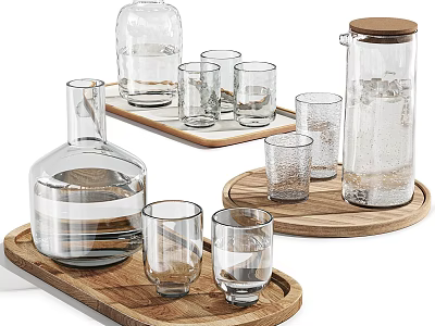 Transparent Glass Cups And Carafes Of Different Sizes On Wooden Trays For Drinking 3d model