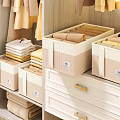 Woven Beige Storage Bins Organize Folded Clothes in Bedroom Drawers