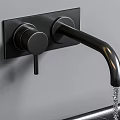 Wall Mounted Black Faucet with Dual Handle Running Water on Gray Wall