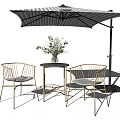 Outdoor Metal Frame Woven Chairs With Small Round Table Striped Umbrella And Green Plant