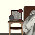 Wooden Bedside Table With Red Lamp Gray Vase And Picture Frame Next To Bed