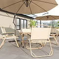 Outdoor Chairs in Patio Setting With Sun Umbrellas Green Plants and Gray Floor Tiles