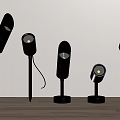 Modern Black Downlights and Spotlights with Various Stylish Designs on Wooden Surface