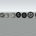Car Tires With Various Stylish Designs Arranged On White Ground Under Cloudy Blue Sky