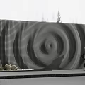 Modern Feature Wall With Spiral Perforated Pattern And Green Plants Near Person Standing