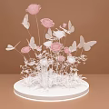 Elegant Floral Display With Pink Roses White Flowers And Butterflies On White Circular Base