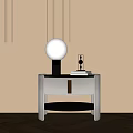 Modern White Leather Nightstand With Glass Globe Lamp Stack Of Books And Beige Wall Lighting