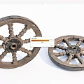 Two Vintage Wooden Wheels With Carved Spokes And Aged Natural Texture
