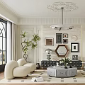 Elegant Modern Living Room With Curved Sofas Round Coffee Table Decorative Artworks And Ceiling Molding