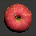 Fresh Red and Yellow Apple with Glossy Skin on Dark Background and Shiny Reflection