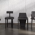 Modern Black Dining Chairs With Different Designs Against Gray Textured Wall 3d model