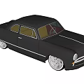Black Vintage Classic Car with Sleek Body Lines Silver Wheels and Round Headlights