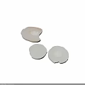 Three Fresh White Round Plant Slices on Black Background Close Up