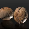 Natural Whole Walnuts With Textured Shells On Black Reflective Surface
