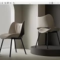 Modern Leisure Chair With Light Upholstery And Black Metal Legs In Minimalist Interior