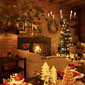 Cozy Living Room With Red Brick Fireplace Lit Fire Christmas Tree And Decorations