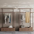 Wooden Clothes Rack With Hanging Clothes Towel And Storage Drawers Against Decorative Patterned Wall