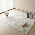 Square Area Rug On Wooden Floor With Pattern White Flower Bouquet Magazines And Dark Clothes