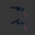 Two Vintage Revolver Pistols With Black Barrel And Brown Grip