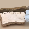 Various Natural Stone And Wood Pieces With Rough Textured Surfaces