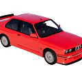Red BMW Two Door Sports Car With Rear Spoiler And Alloy Wheels