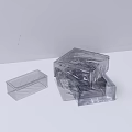 Minimalist Gray Wall with Stacked Transparent Plastic Storage Boxes in Interior 3d model
