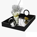 Refreshing Cocktail Drink in Glass with Ice Cubes and Lemon on Black Tray with Martini Glass